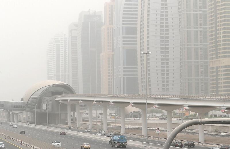 DUBAI , UNITED ARAB EMIRATES , JULY 30 – 2018 :- View of the residential and office towers during the dusty and hot weather in Jumeirah Lake Towers in Dubai. ( Pawan Singh / The National )  For News.