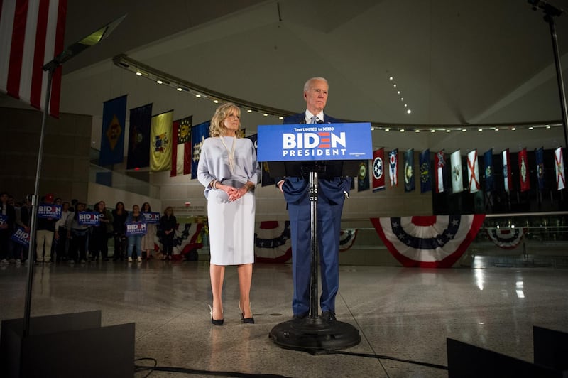 epaselect epa08284890 Democratic Party presidential candidate Joe Biden (R), accompanied by his wife Jill Biden (L), speaks at a primary night event at the National Constitution Center in Philadelphia, Pennsylvania, USA, 10 March 2020. Results from primary elections in five states come in on the evening of 10 March, as Biden and Sanders compete for the Democratic party nomination.  EPA-EFE/TRACIE VAN AUKEN
