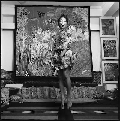 Pacita Abad in 1985, in front of one of her works showing marine life in the Philippines. Photo Wig Tysmans