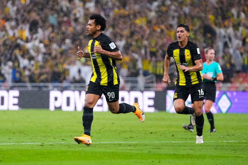 Al Ittihad's Romarinho, left, celebrates after scoring the opening goal. AP
