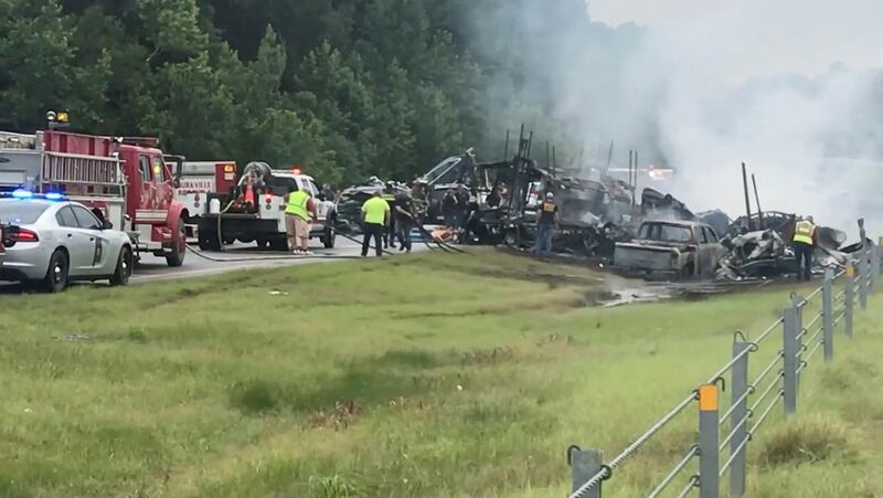 Ten deaths have been reported after 18 vehicles crashed on a rain-drenched road in the US state of Alabama. Reuters