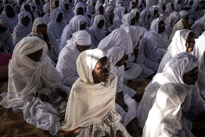 Layene Muslim pilgrims arrive at the start of their yearly pilgrimage at the Seydina Issa Rohou Laye Mausoleum in Camberene, Senegal. Each year thousands of Layene Muslim community followers make the pilgrimage, which starts at the birthplace of the Layene community in Camberene and finishes at the sacred recollection cave in Ngor. AFP