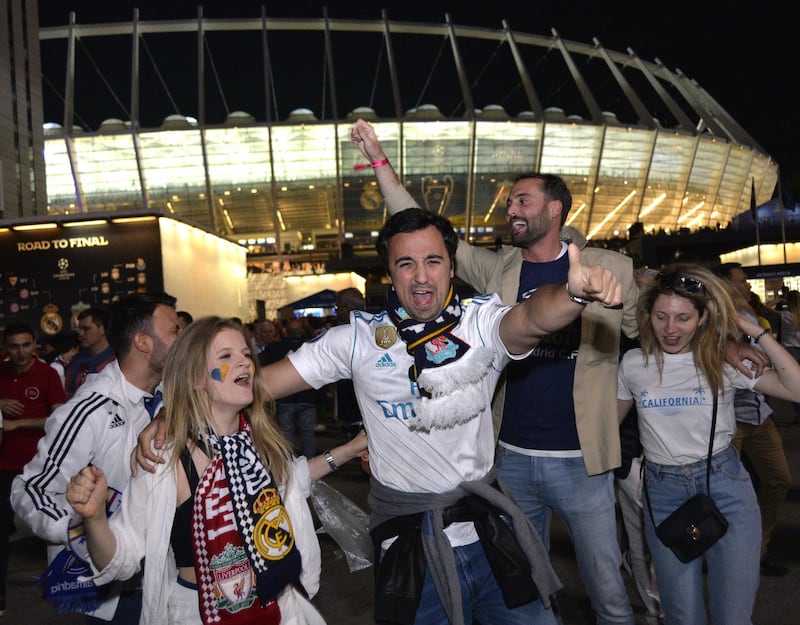 Real Madrid fans celebrate at the stadium in central Kiev. Sergei Chuzavkov / AFP
