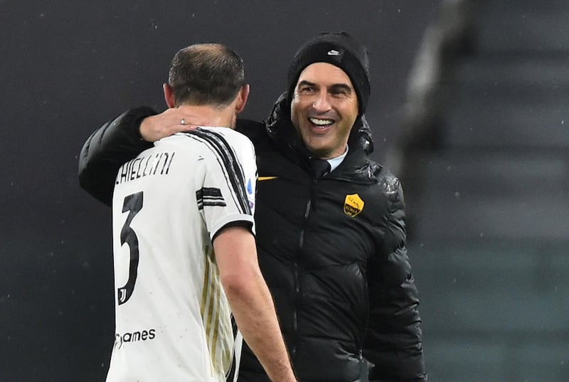 Juventus' Giorgio Chiellini with Roma manager Paulo Fonseca after the match. Reuters