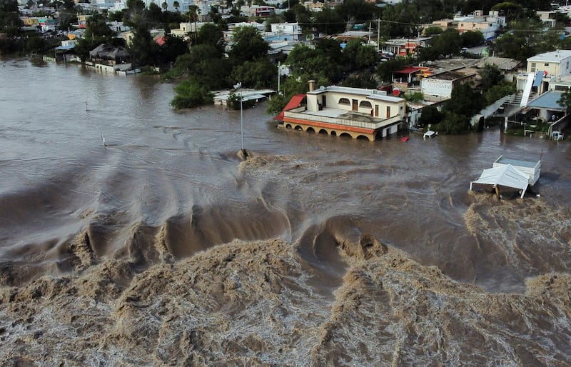 Flood damage from the Sabinas river caused by heavy rains in Sabinas, Mexico. Reuters