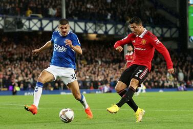 Soccer Football - Premier League - Everton v Manchester United - Goodison Park, Liverpool, Britain - October 9, 2022 Manchester United's Cristiano Ronaldo scores their second goal and his 700th club goal Action Images via Reuters/Carl Recine EDITORIAL USE ONLY.  No use with unauthorized audio, video, data, fixture lists, club/league logos or 'live' services.  Online in-match use limited to 75 images, no video emulation.  No use in betting, games or single club /league/player publications.   Please contact your account representative for further details.      TPX IMAGES OF THE DAY