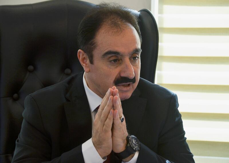 Mohamed Afif, the lawyer of former royal court chief Bassem Awadallah, speaks during an interview with Reuters in his office in Amman, Jordan. Reuters