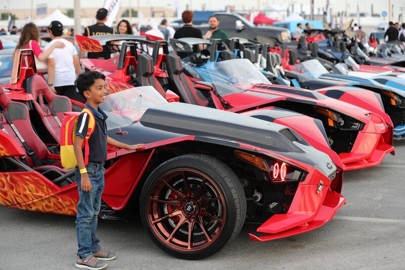 Dubai, United Arab Emirates - November 16, 2018: A visitor at the annual Gulf Car Festival. Friday the 16th of November 2018 at Festival City Mall, Dubai. Chris Whiteoak / The National