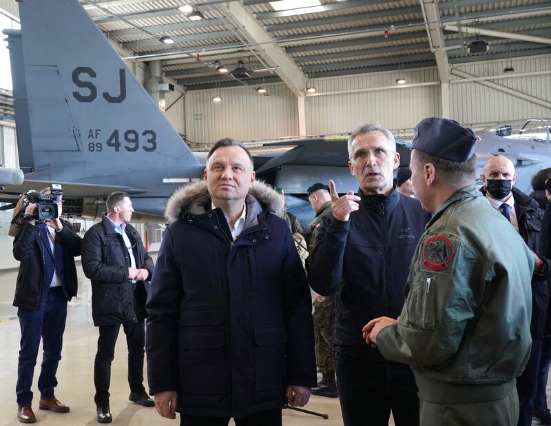 Polish President Andrzej Duda, left, and Nato Secretary General Jens Stoltenberg at the military airbase in Lask, Poland. AFP
