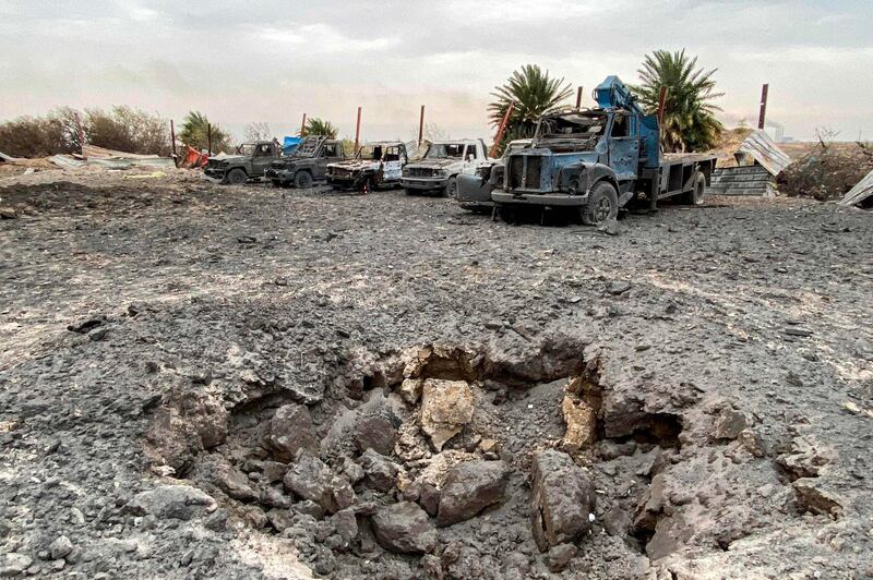 An impact crater in the aftermath of US military air strikes at a militarized zone in the Jurf Al Sakhr area in Iraq's Babylon province. AFP