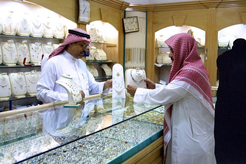 The Saudi retail sector has relatively low barriers to entry in terms of qualifications but even still there are entrenched barriers to overcome in terms of the social contract. Bilal Qabalan / AFP