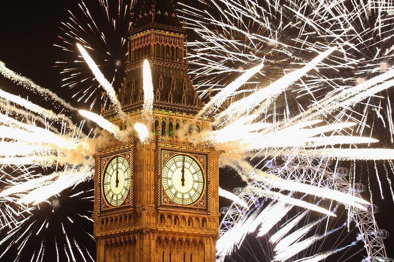 LONDON, ENGLAND - JANUARY 01:  Fireworks light up the London skyline and Big Ben just after midnight on January 1, 2012 in London, England. Thousands of people lined the banks of the River Thames in central London to see in the New Year with a spectacular fireworks display.  (Photo by Dan Kitwood/Getty Images) *** Local Caption ***  136301444.jpg
