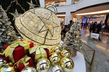  People do last minute Christmas shopping at Mall of the Emirates in Dubai. Pawan Singh / The National