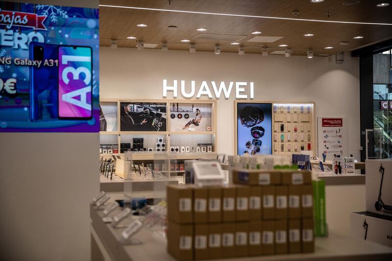 Huawei Technologies Co. smartphones and tech products on display inside the AliExpress plaza retail store, operated by Alibaba Group Holding Ltd., in Barcelona, Spain, on Wednesday, Jan. 13, 2020. U.S. officials deliberated but ultimately decided against banning American investment in Alibaba and Tencent Holdings Ltd., a person familiar with the discussions said, removing a cloud of uncertainty over Asia’s two biggest corporations. Photographer: Angel Garcia/Bloomberg