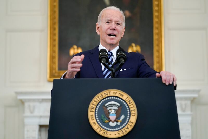 President Joe Biden said 'America is back to work' after the country reported unexpected jobs growth in January. AP