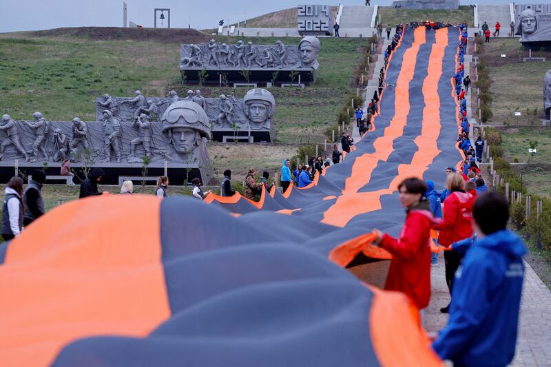 A giant St George's ribbon at the Savur-Mohyla memorial in Donetsk in Russian-controlled Ukraine at a ceremony marking the 79th anniversary of the victory over Nazi Germany in the Second World War. Reuters