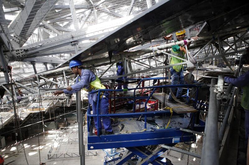 A scene from the Louvre Abu Dhabi’s internal construction, showing its spectacular dome and the removal of the temporary towers that have supported the structure. Christopher Pike / The National