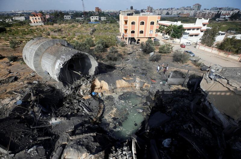 The damage at the site of an Israeli air strike in Al-Mughraqa. Reuters