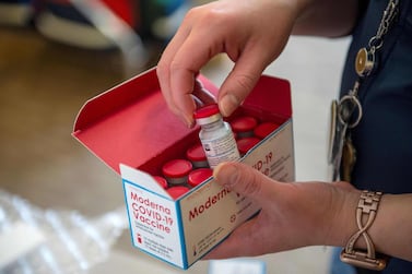 A refrigerated box of Moderna’s Covid-19 vaccine is opened in Boston, US. AFP