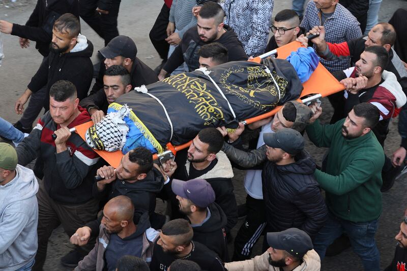 The funeral of one of the victims of the Israeli raid. AFP