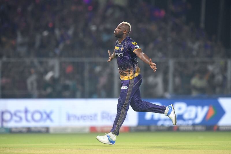Kolkata Knight Riders' Andre Russell celebrates after taking the wicket of Sunrisers Hyderabad's Rahul Tripathi. AFP