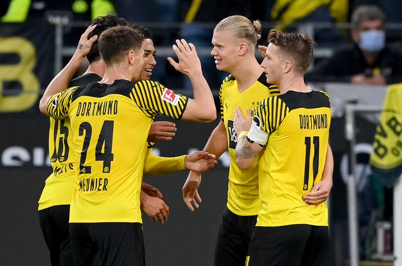 Erling Haaland celebrates scoring with teammates Marco Reus, Mats Hummels, Thomas Meunier and Mahmoud Dahoud. Getty