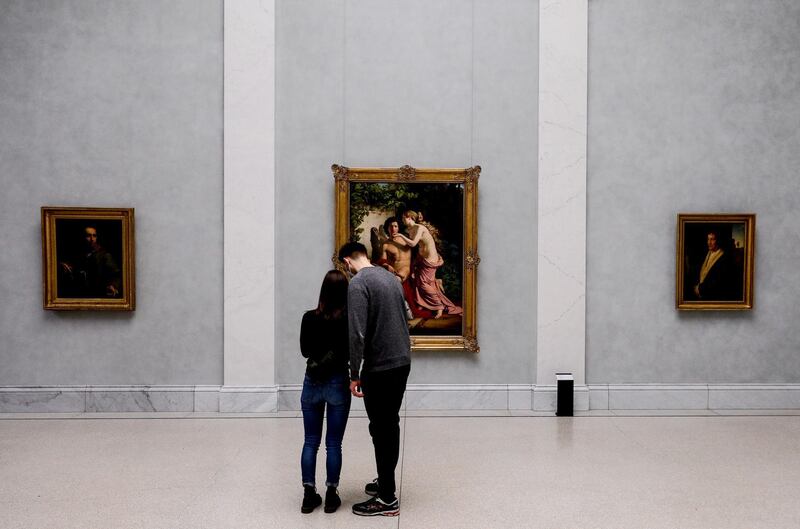 Visitors at the Old National Gallery in Berlin, Germany. While museums have been closed due to the Covid-19 pandemic, those in Berlin are reopening, as lockdown measures are gradually eased. EPA