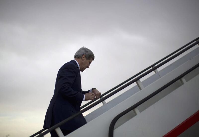 John Kerry boards his plane at Amman airport en route to Israel. Jason Reed / AP