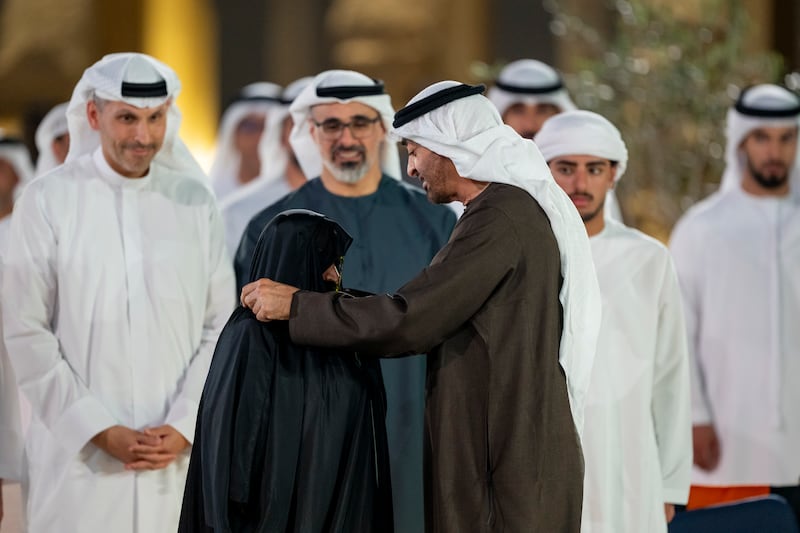 President Sheikh Mohamed presents an Abu Dhabi Award to Amna Khalifa Al Qemzi, a pioneer of organic agriculture and champion of sustainability. Abdulla Al Bedwawi / UAE Presidential Court 