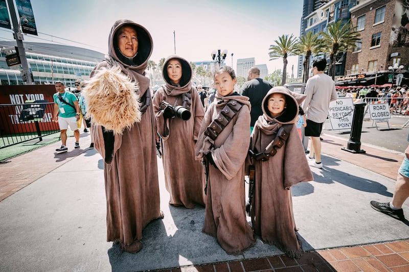 Star Wars fans dressed as Jawas. AFP
