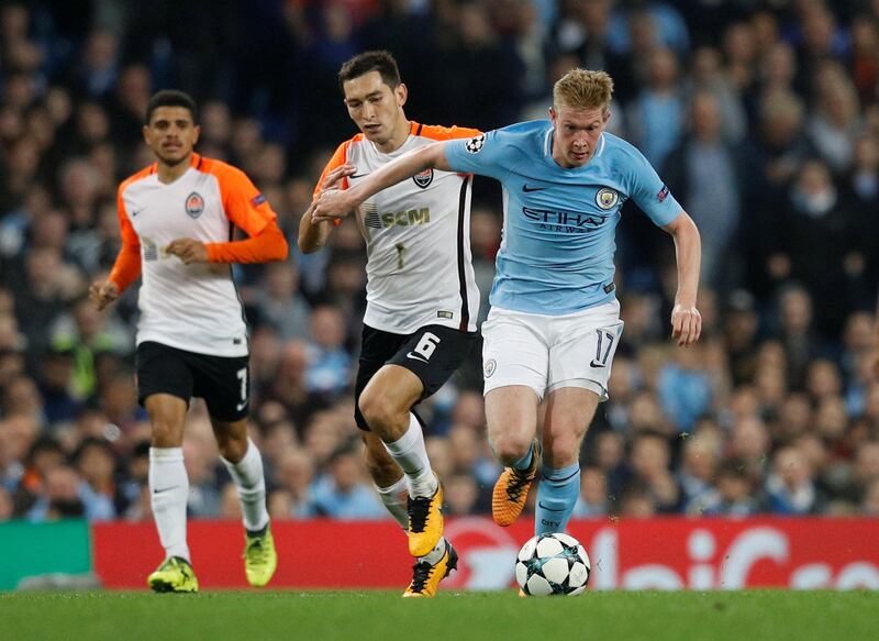 Manchester City's Kevin De Bruyne in action with Shakhtar Donetsk's Taras Stepanenko. Phil Noble / Reuters