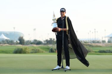 ABU DHABI, UNITED ARAB EMIRATES - JANUARY 22: Victor Perez of France talks on the eighteenth green after being presented with the trophy after winning the final round of the Abu Dhabi HSBC Championship at Yas Links Golf Course on January 22, 2023 in Abu Dhabi, United Arab Emirates. (Photo by Andrew Redington / Getty Images)
