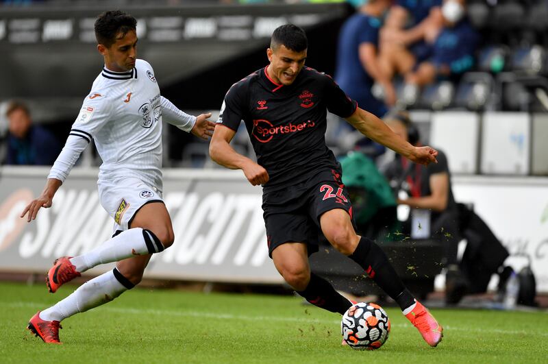 Swansea City's Yan Dhanda has represented England at youth level. His father hails from Punjab while his mother is English. PA