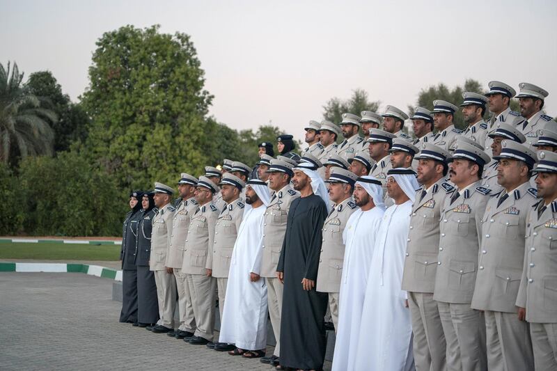 AL AIN, ABU DHABI, UNITED ARAB EMIRATES - December 04, 2017: HH Sheikh Mohamed bin Zayed Al Nahyan, Crown Prince of Abu Dhabi and Deputy Supreme Commander of the UAE Armed Forces (front row 8th R), stands for a photograph with members of Abu Dhabi Police, during a barza, at Al Maqam Palace. Seen with HE Brigadier Maktoum Ali Al Sharifi, Acting Director General of Abu Dhabi Police (front row 7th R) and HE Major General Mohamed Khalfan Al Romaithi, Commander in Chief of Abu Dhabi Police and Abu Dhabi Executive Council Member (front row 9th R).

( Mohamed Al Hammadi / Crown Prince Court - Abu Dhabi )
---