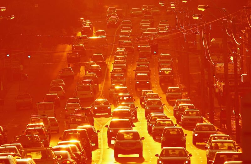 Rush hour traffic on a congested road as the sun sets in Melbourne, Australia. Scott Barbour / Getty