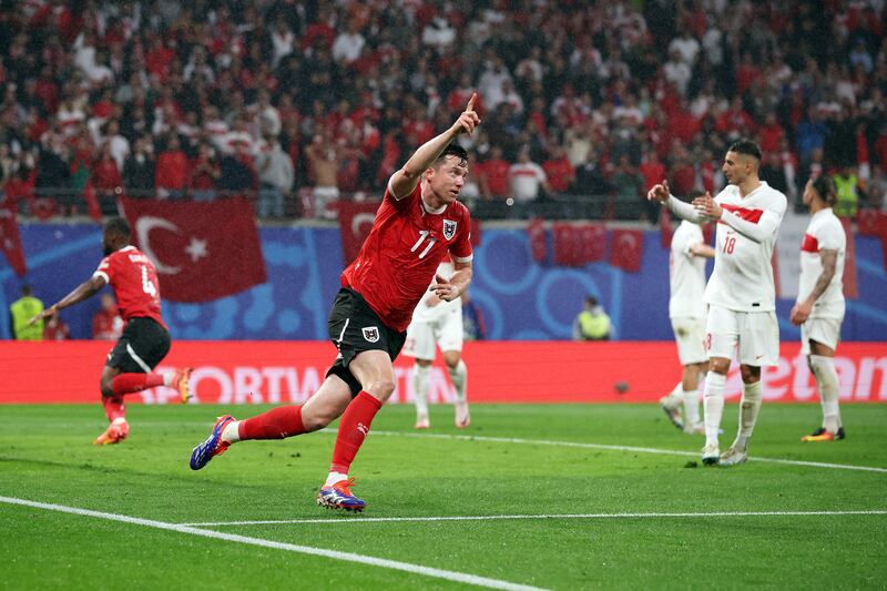 Michael Gregoritsch of Austria celebrates after scoring his team's first goal. Getty Images