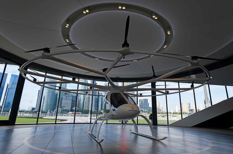 A Volocopter is displayed at the Voloport protoype launch pad in Marina Bay where the Volocopter unmanned air taxi transport test flight will take place during the 26th Intelligent Transport Systems World Congress (ITSWC) in Singapore.  AFP