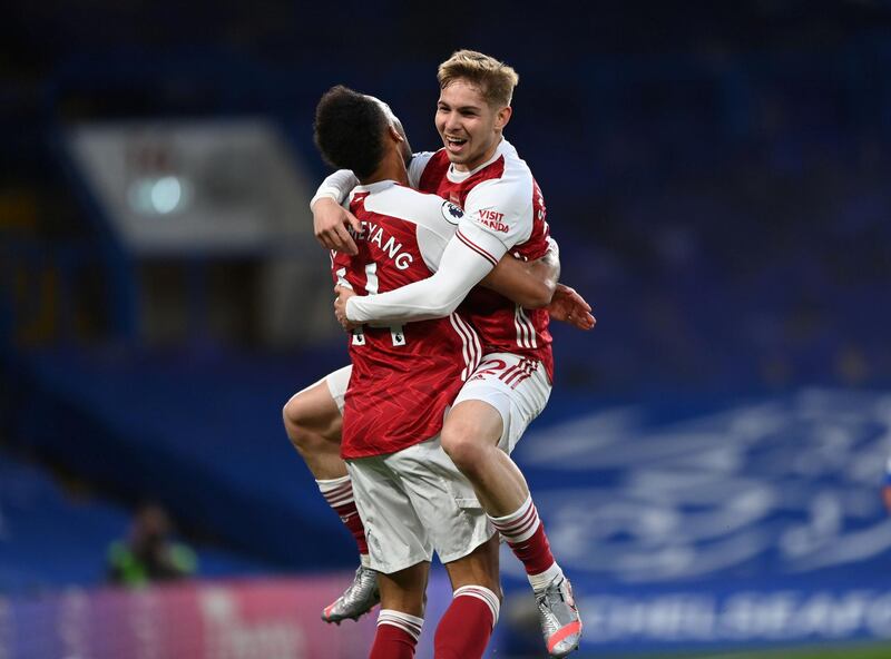 Arsenal's Emile Smith Rowe celebrates with Pierre-Emerick Aubameyang. Reuters