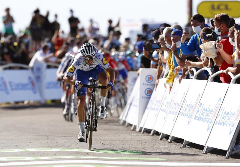 French rider Julian Alaphilippe, of the Deceuninck Quick-Step, crosses the finish line. EPA