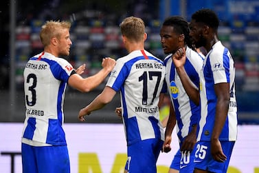 Hertha's Dedryck Boyata (2nd from right) celebrates with his teammates after scoring the fourth goal against Union Berlin. Getty