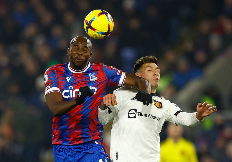 Crystal Palace's Jean-Philippe Mateta in action with Manchester United's Lisandro Martinez. Action Images