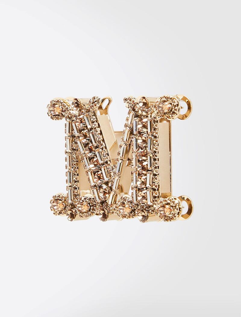 Exclusive to the Middle East: rhinestone brooch, from Max Mara