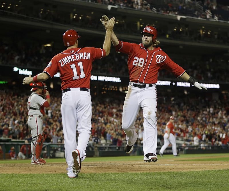 Jayson Werth, right, and Ryan Zimmerman are two of the reasons the Washington Nationals are climbing back into the play-off race in the National League. Pablo Martinez Monsivais / AP Photo