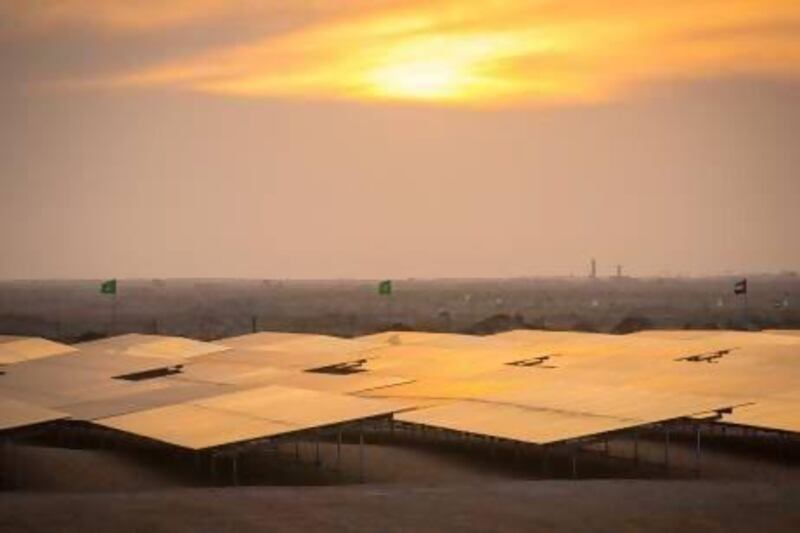 UAE flags fly at the Sheikh Zayed Solar Power Plant in Mauritania. Courtesy Clement Tardif