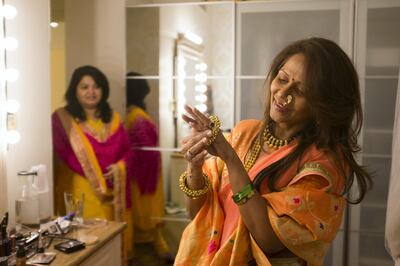 DUBAI, UNITED ARAB EMIRATES - NOVEMBER 6, 2018. 

Nivedita Khursude puts on her bangles for Diwali.

(Photo by Reem Mohammed/The National)

Reporter:
Section:  WK