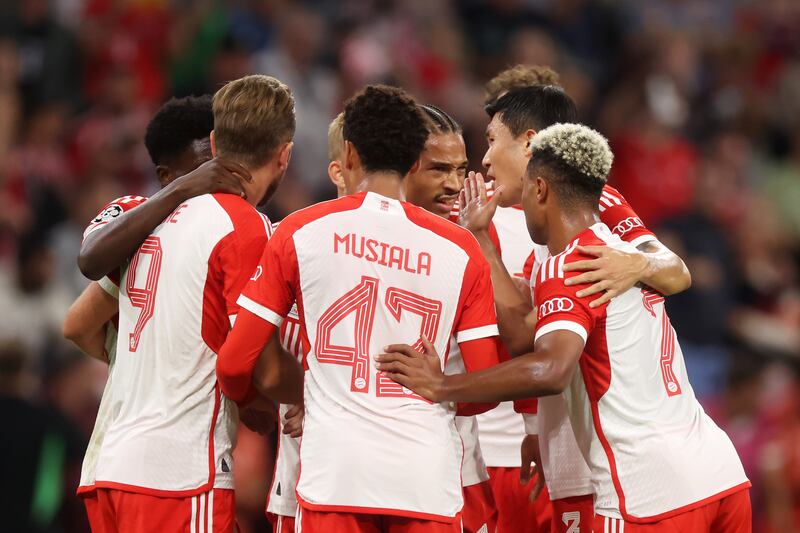 Leroy Sane of Bayern Munich celebrates with teammates after scoring their first goal. Getty 