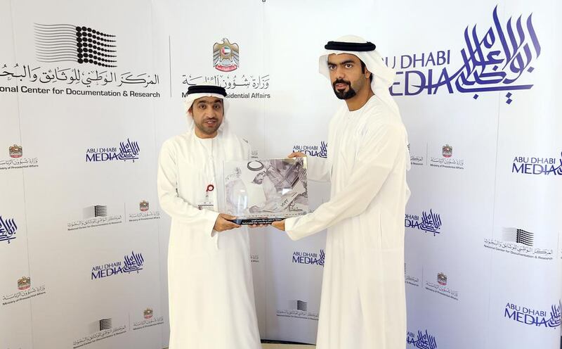 The agreement was signed by Majed Al Muhairi, left, Executive Director of the National Centre for Documentation and Research, and Saif Ghobash, Chief Operating Officer of Abu Dhabi Media at NCDR’s headquarters. Abu Dhabi Media