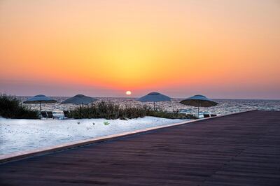 Dine on the boardwalk at Jumeirah Saadiyat Island Resort. Courtesy Grace Guino