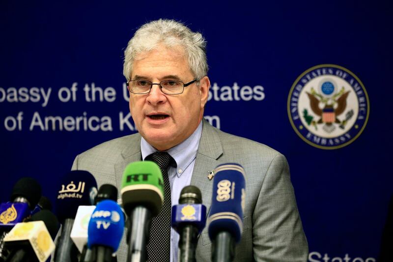 Top US envoy in Khartoum, Charge D'affaires Steven Koutsis, speaks during a press conference at the US embassy on October 7, 2017, a day after Washington lifted its 20-year-old trade embargo imposed on Sudan over alleged support to violent Islamist groups. - The US decision came after months of diplomatic talks between the two countries that began during the tenure of former US president Barack Obama. (Photo by ASHRAF SHAZLY / AFP)