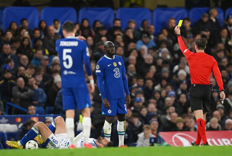 Referee Francois Letexier shows a yellow card to Chelsea defender Kalidou Koulibaly in the first half. Getty